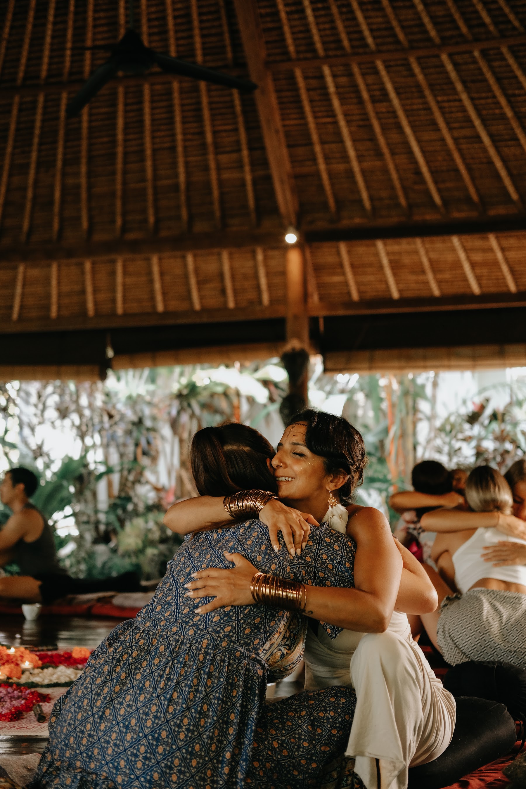 A facilitator supporting a participant during an InnerCamp session