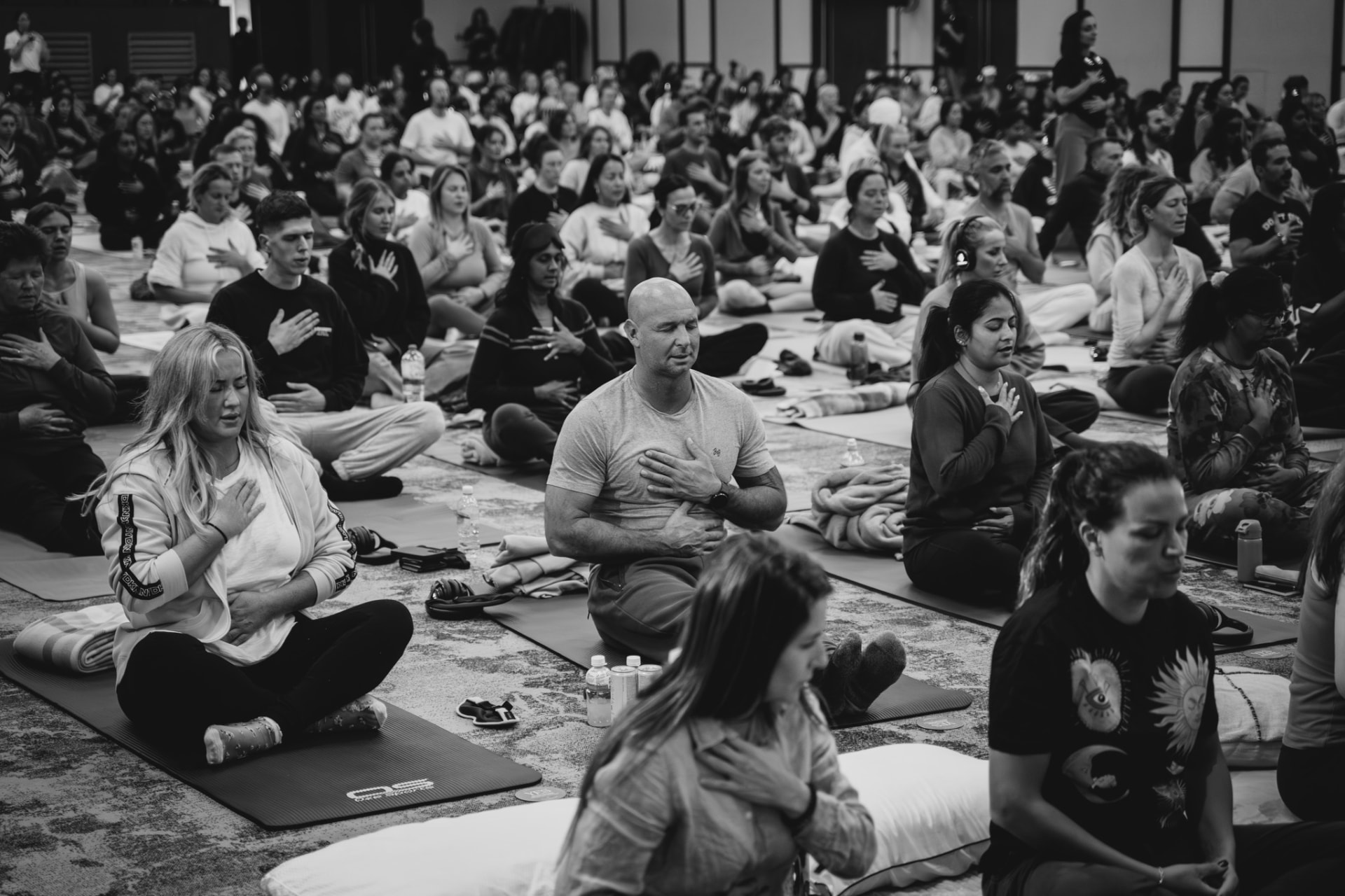 A full ballroom in shared practice — from a previous InnerCamp retreat